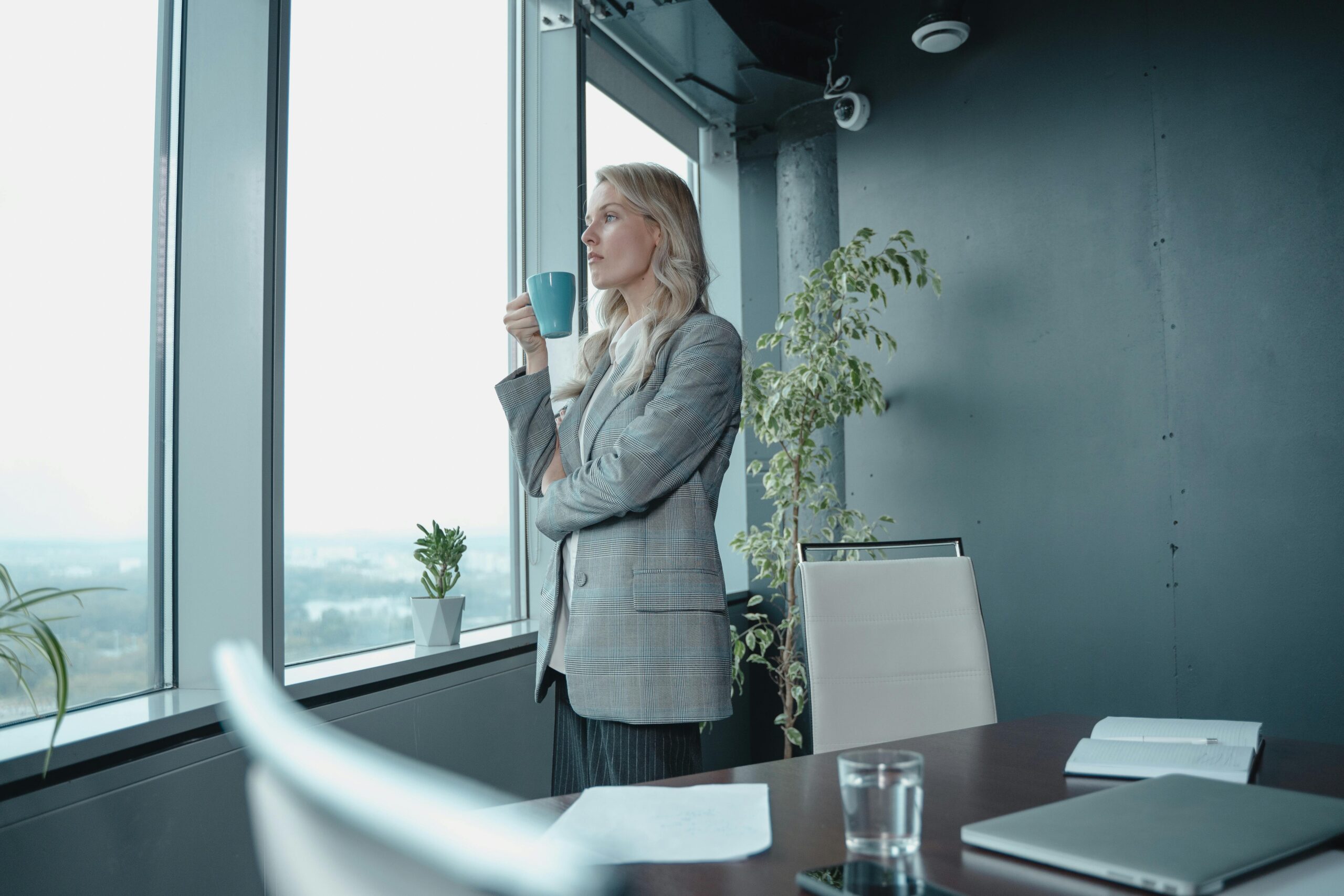 A professional woman contemplating about her career map in the office.