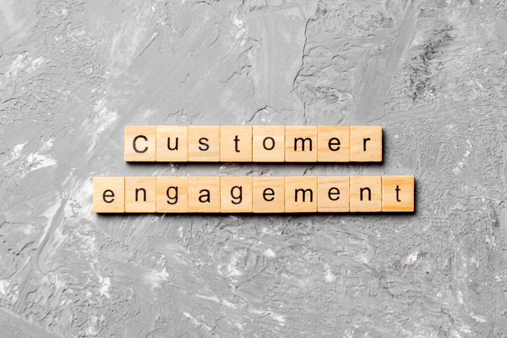 The word customer engagement written on wooden blocks.