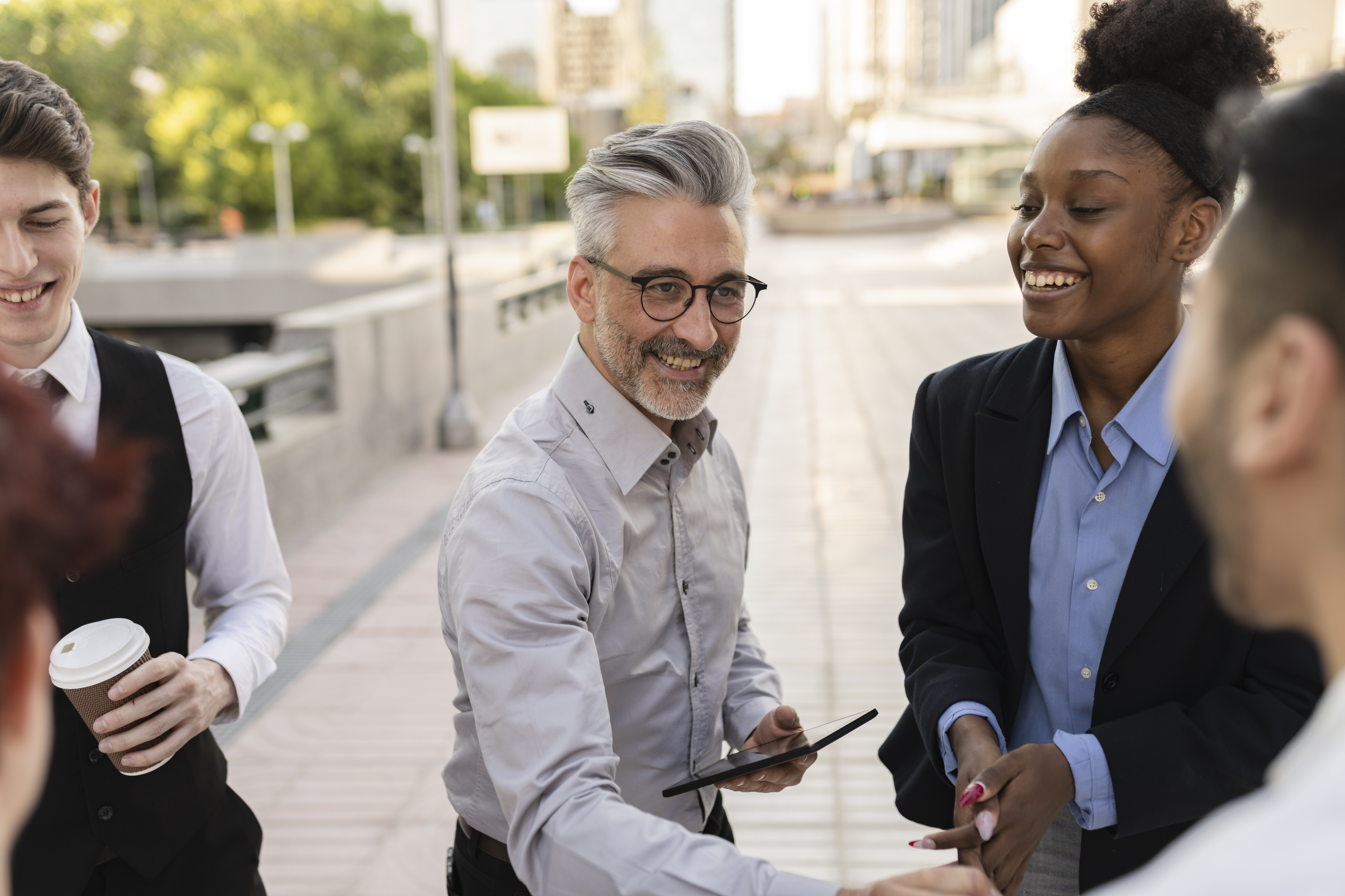 Professionals engaging in real conversations and relationship-building through face-to-face marketing.
