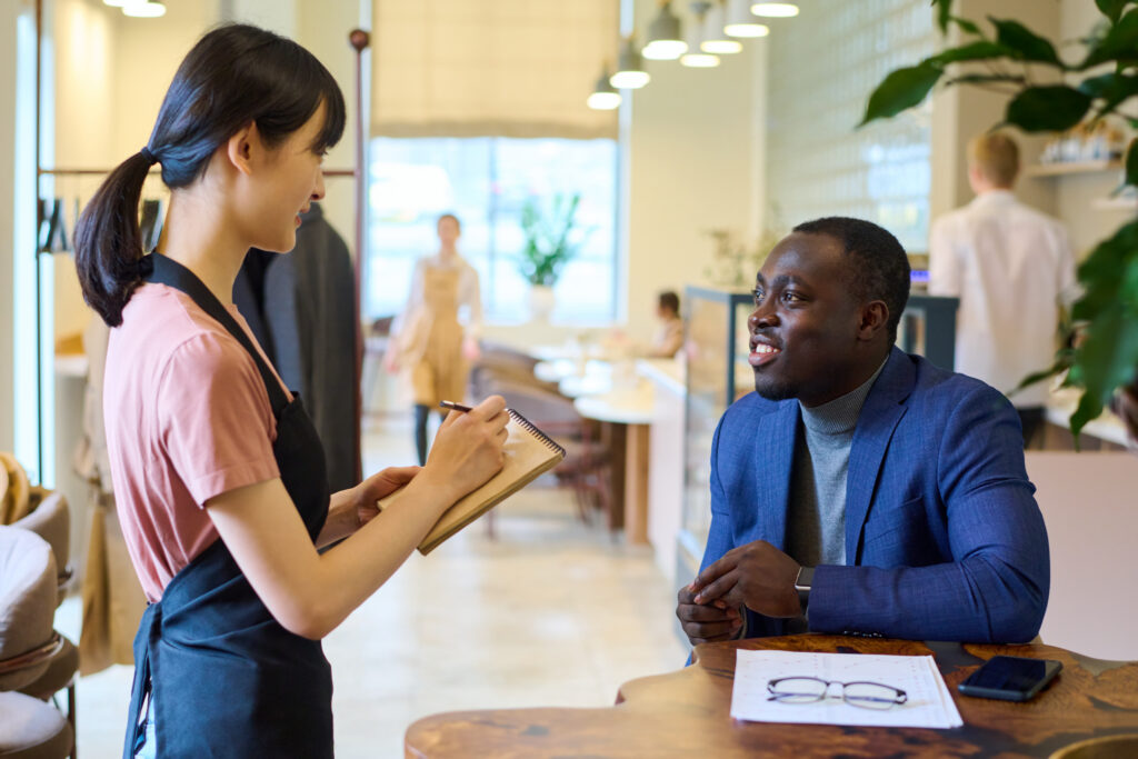Customer interaction showcasing personalized service and essential sales duties for a positive experience.